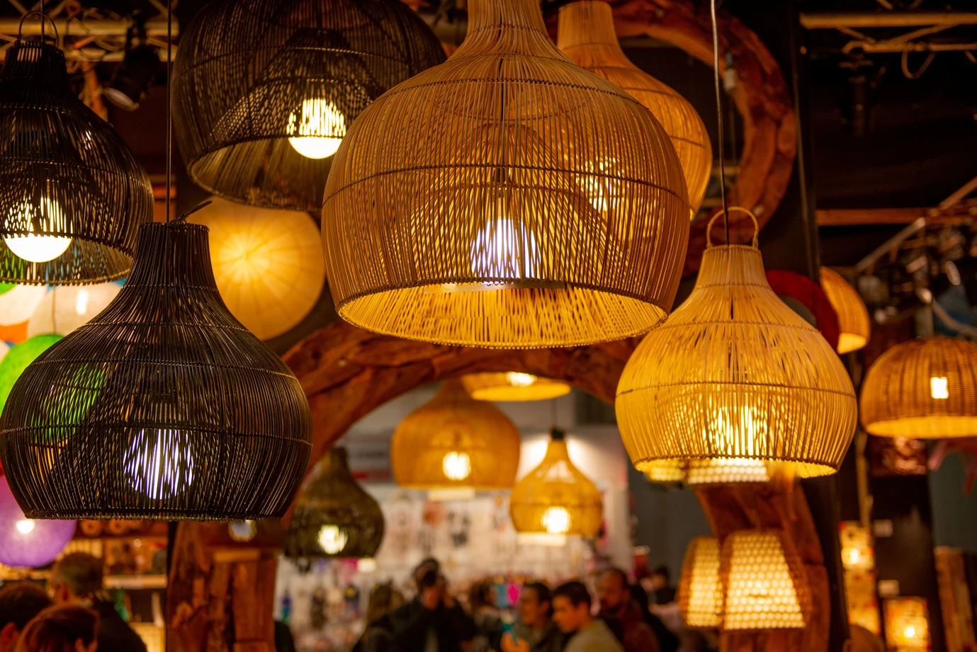 Warm light shining through crafted lamps